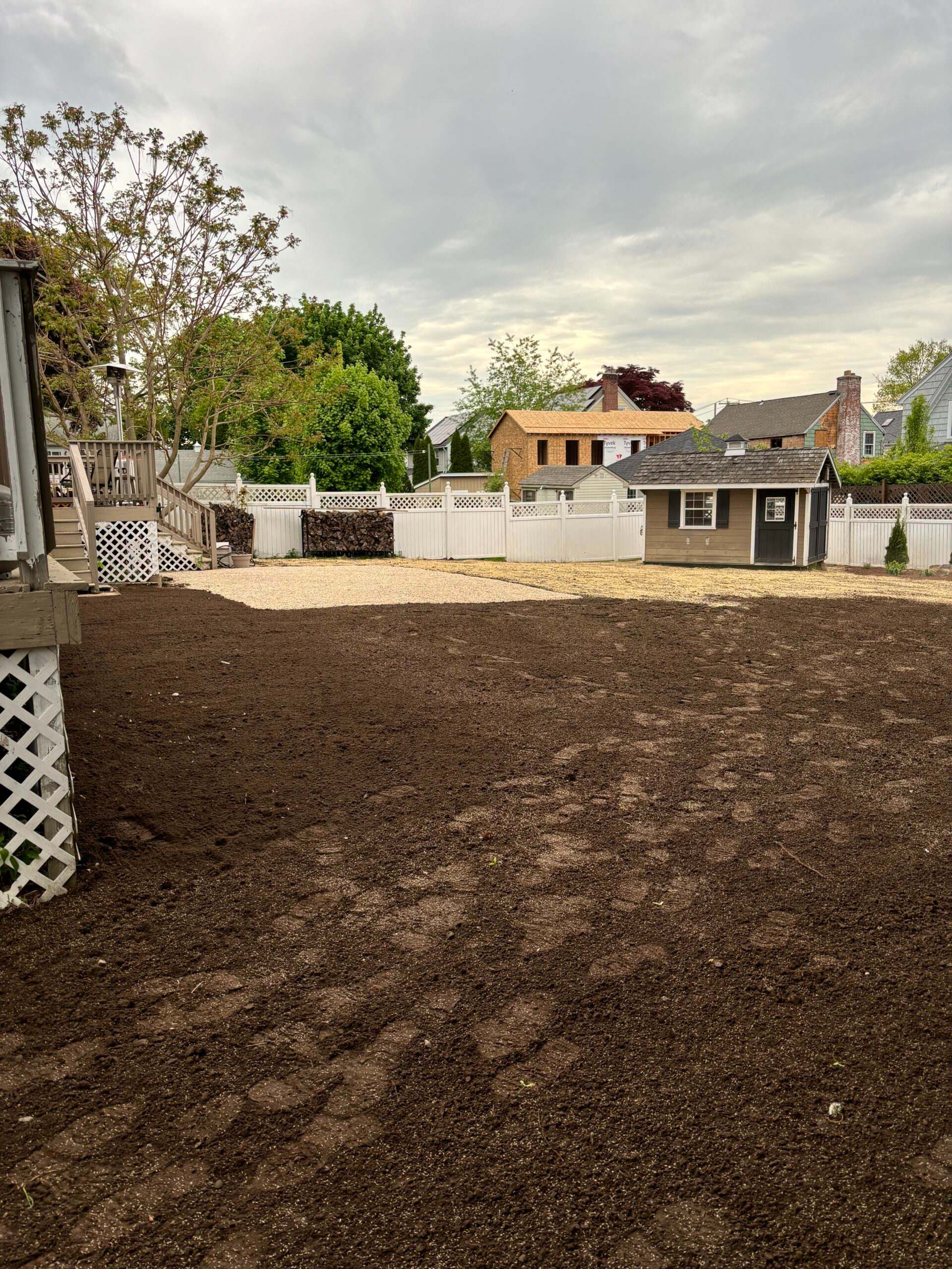 After: yard restored after pool demolition and fill
