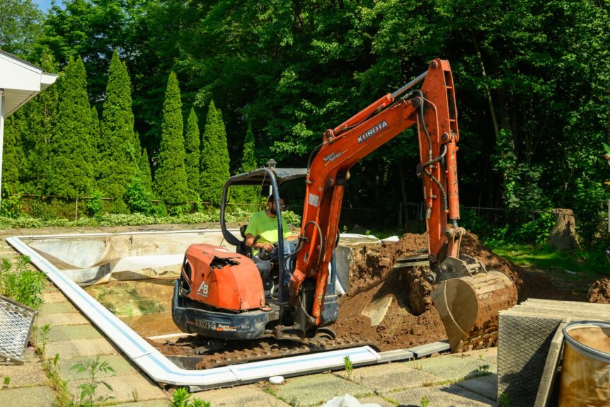 During pool removal in Bristol CT with excavator working in the pool shell